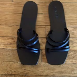A.emery black sandals.